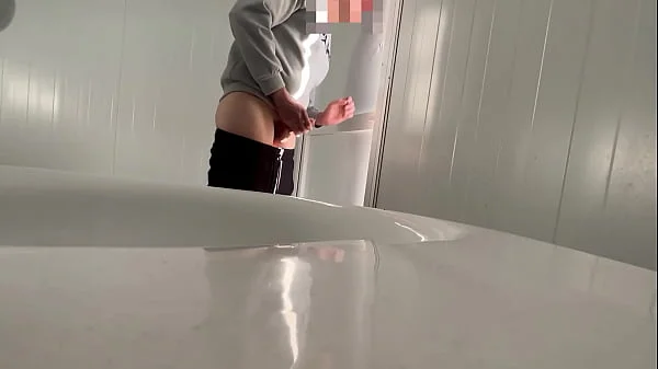 I surprise a girl who catches me jerking off in a public bathroom on the beach and helps me finish cumming