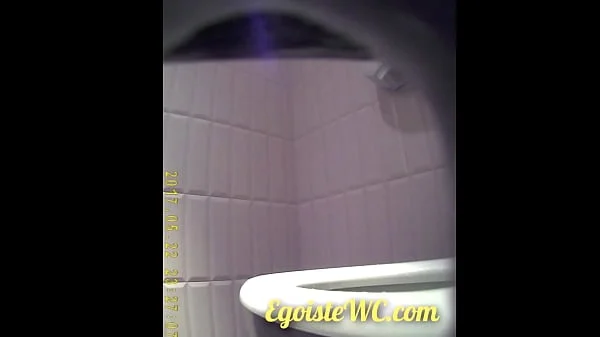 The camera in the women's toilet filmed the beautiful vaginas of girls close-up