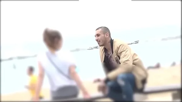 He proves he can pick any girl at the Barcelona beach