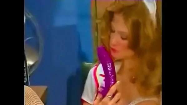 Naugthy nurse pleasures herself in front of the mayor